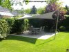 Freistehendes viereckiges Sonnensegel von Lisori über einer Terrasse im Aussenbereich eines Gartens | Lisori Sonnensegel